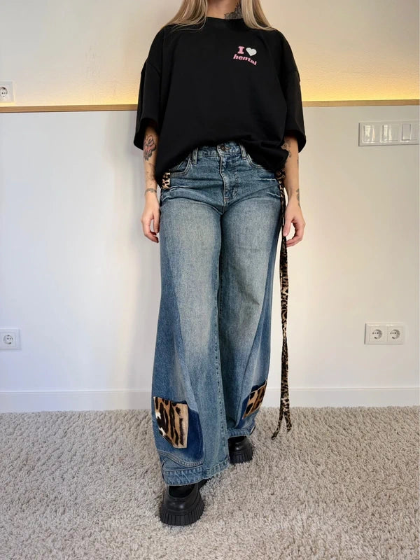 Custom animal print double denim trousers