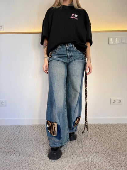 Custom animal print double denim trousers