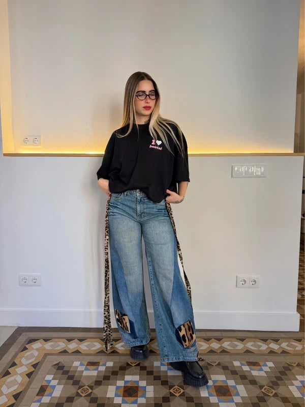 Custom animal print double denim trousers