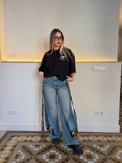 Custom animal print double denim trousers