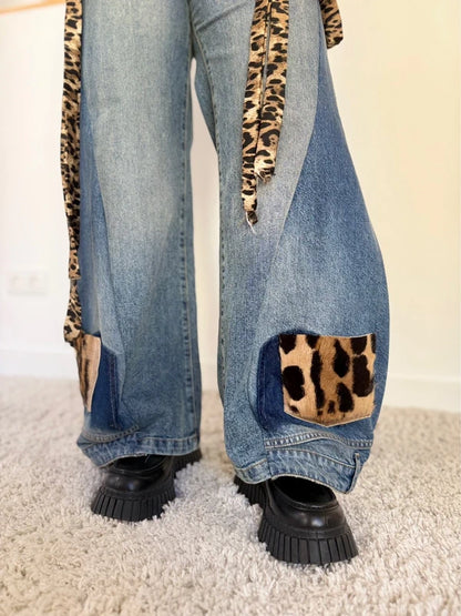 Custom animal print double denim trousers