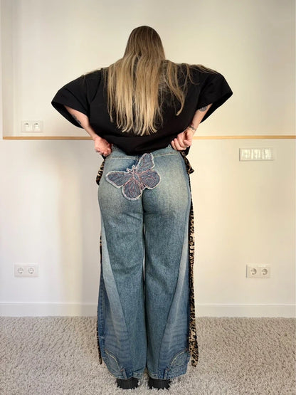 Custom animal print double denim trousers